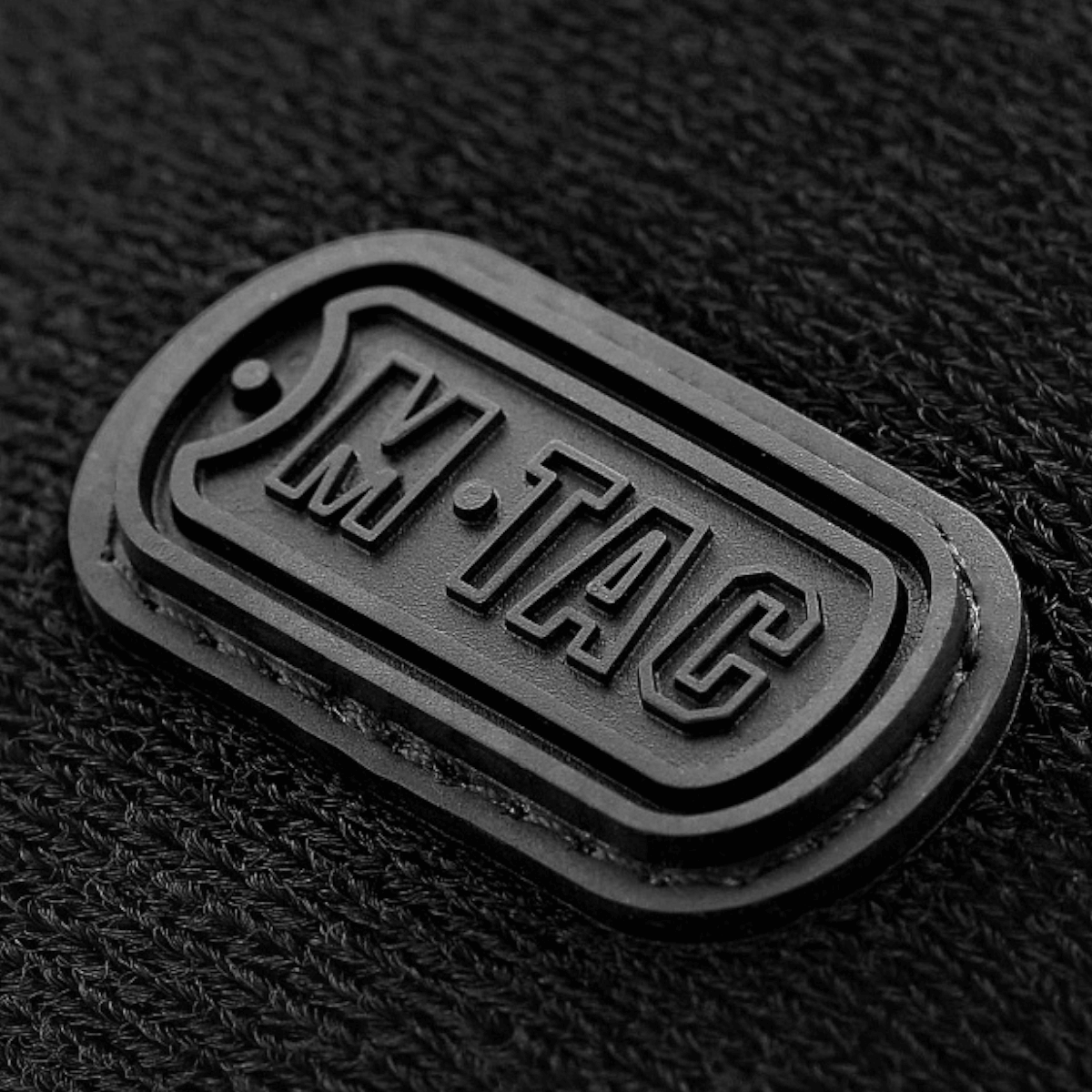 Logo af M-Tac Carry Sling Taske Elite Gen.IV med Velcro på taskeoverflade