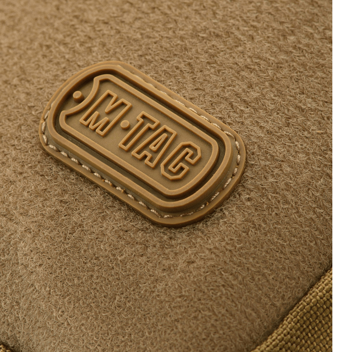M-Tac Carry Sling Taske Elite Gen.IV med Velcro i sandfarvet design med synligt M-Tac logo på tekstur. Skuldertaske med velcro-funktion.