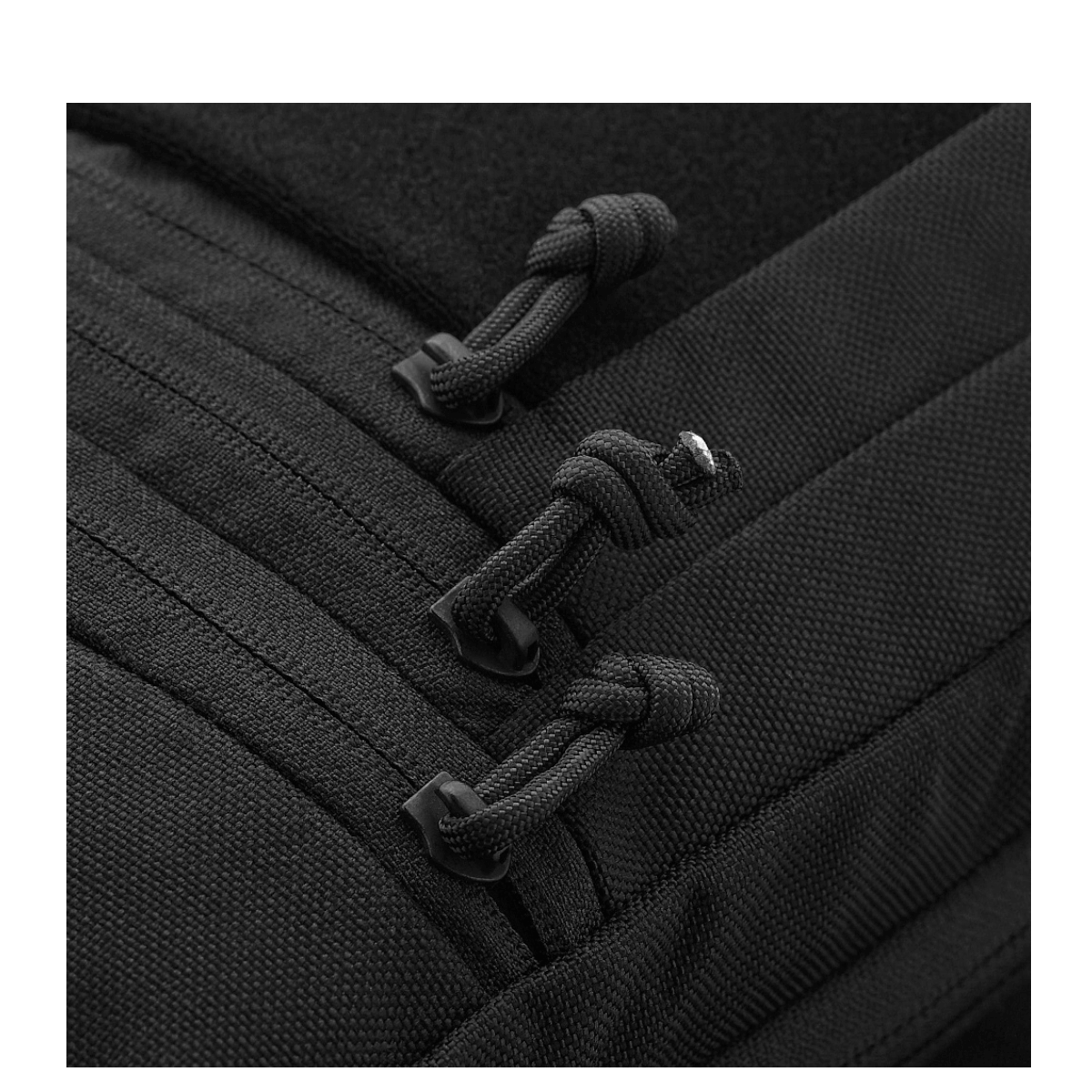 Detalje af lynlåse på M-Tac Carry Sling Taske Elite Gen.IV med Velcro designet til skjult bæring af våben, justerbar og diskret.