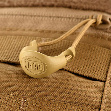 M-Tac Ryggsekk Gen.II Elite Large detalj av søm og forsterkning i Cordura-materiale med glidelåstrekk.
