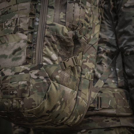 M-Tac Ryggsekk Large Gen.IV Elite i slitesterkt Cordura-materiale, kamuflasjedesign, egnet for daglig bruk og transport av adskilte våpen.