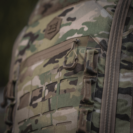 M-Tac Ryggsekk Large Gen.IV Elite i Cordura-materiale, kamuflasjedesign, nærbilde av slitesterke og funksjonelle detaljer.