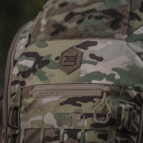 M-Tac Ryggsekk Large Gen.IV Elite i slitesterkt Cordura-materiale med kamuflasjedesign og lomme for oppbevaring av våpen.