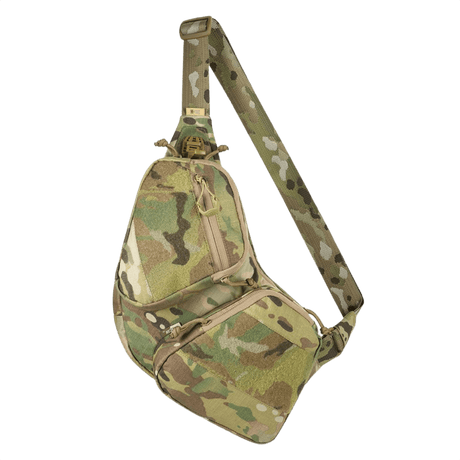 M-Tac Bat Wing Bag Elite i kamuflasjedesign, laget av holdbar Cordura 500 MS med YKK-glidelåser, velourfôr og sikkerhetsmekanisme.