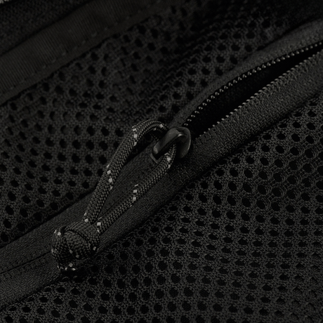 Nærbilde av glidelåsen på M-Tac Magnet XL Bag Elite.