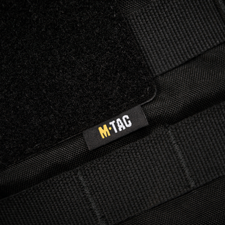 M-Tac-panel for patches på MOLLE 80x85 med hook & loop overflate, plastbase for stabilitet og MOLLE-feste. Mål: 80x85 mm.