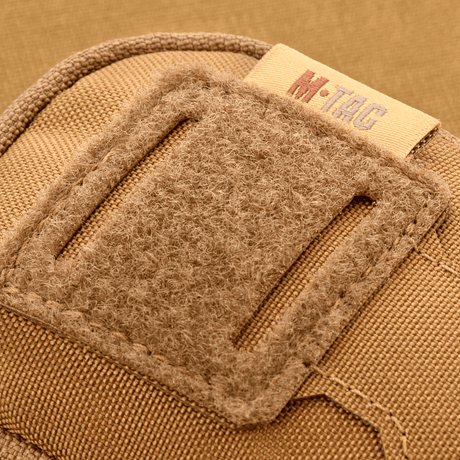 Nærbilde av M-Tac PC Utility Pouch Elite i Cordura, viser Velcro-panel og detaljer i søm, ideell for taktisk bruk.