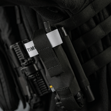 M-Tac Elastisk Tourniquet Pouch Molle Gen.III i svart Cordura med elastikkdetaljer for sikker festing av C-A-T tourniquet.
