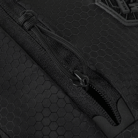 Detalj av glidelås på M-Tac Sphaera Hex Hardsling-veske Gen.II Elite med heksagonmønster.