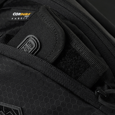 Nærbilde av M-Tac Sphaera Hex Hardsling-veske Gen.II Elite i Cordura Hex-polyester med rom for skjult bæring, glidelåsdetaljer.