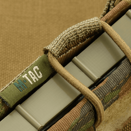 M-Tac Pistol Mag Pouch Gen.3 med justerbare plast-sideskiver og elastikk, laget av Cordura 500D, kompatibel med MOLLE-systemet.