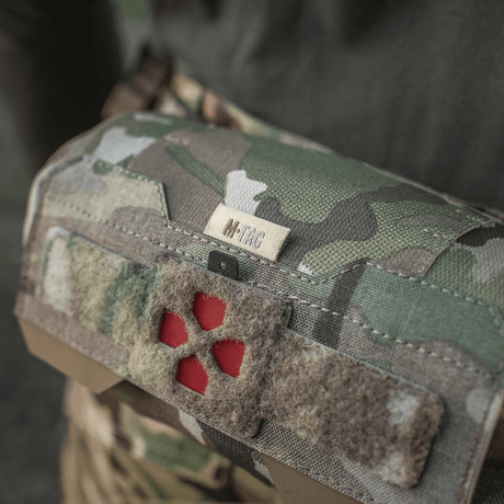 M-Tac Horizontal Medical Pouch Elite i felt med kamuflasjedesign, slitesterkt Cordura 500D og YKK AquaGuard-glidelås.