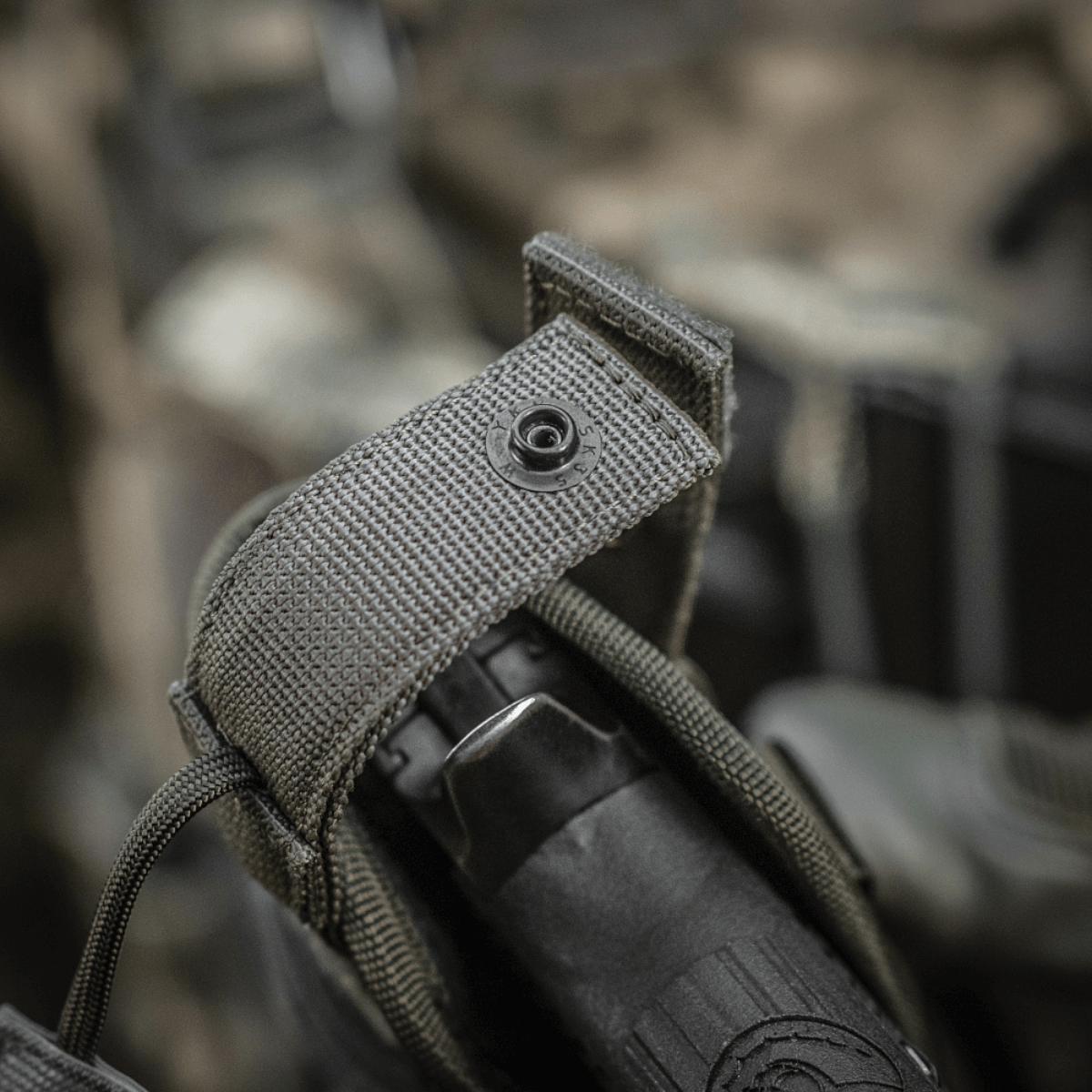 M-Tac Universal Taktisk Hylster Elite Venstre i Cordura 500D, passer til pistoler som Glock 17, med YKK strop og MOLLE-interface.