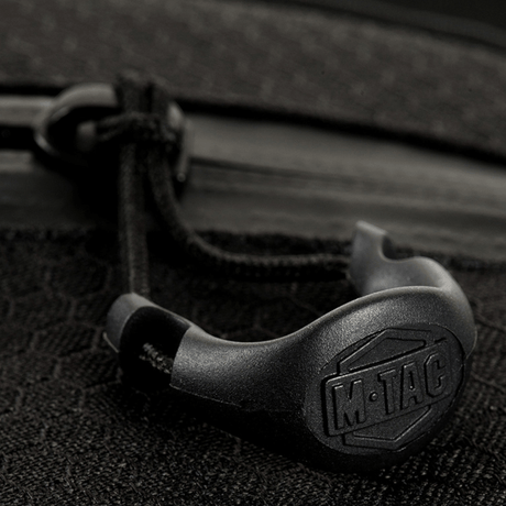 Nærbilde av M-Tac Sling pistolveske Elite Hex lynlås og detaljer.