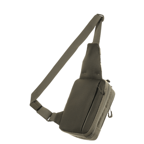 M-Tac Sling pistolveske Elite Hex i robust Cordura med justerbar skulderrem og romslige rom for skjult våpentransport.