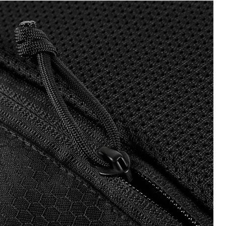 Nærbilde av glidelås og materiale på M-Tac Konvert Taske Elite, laget av Cordura for slitestyrke og komfort.