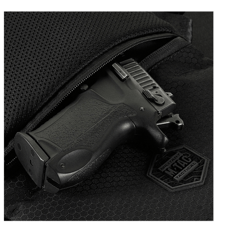 M-Tac Konvert Taske Elite med magnetlukking, laget av slitesterkt Cordura-materiale, vist med dyp lomme og justerbar rem.