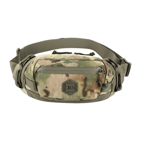 M‑Tac belteveske Elite Hex i kamuflasjemønster, laget av Cordura, med YKK-glidelåser og Woojin-spenner, perfekt for hverdag eller taktisk bruk.