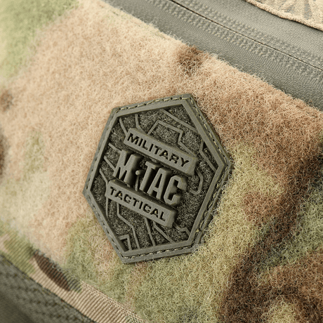 Merke på M‑Tac belteveske Elite Hex med militærinspirert design og Hex-logo. Robust Cordura-materiale med militært uttrykk.