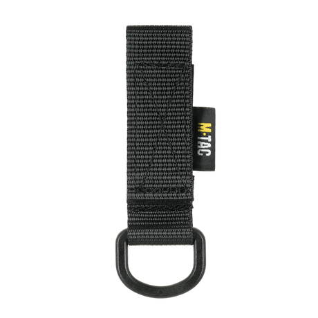 M-Tac feste med D-ring for MOLLE-system, kompakt og lett for taktisk bruk med Velcro-lukking. Funksjonelt tilbehør til utstyr.