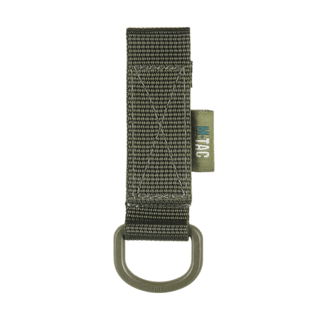 M-Tac feste med D-ring for MOLLE-systemer, komprimerbar og lettvektsdesign ideell for taktisk bruk.