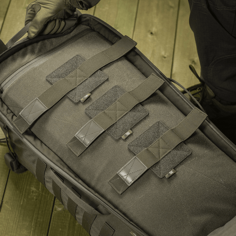 M‑Tac innlegg til ryggsekk (3 stk) sikrer våpen i kasser og M‑Tac Large Elite Hex-ryggsekk med Velcro-panel for optimal sikkerhet.