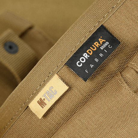 Nærbilde av M‑Tac Magasinsæk Dump Pouch Lite Elite i Cordura 500D-stoff med synlige tegn som fremhever holdbarhet og sterkt materiale.