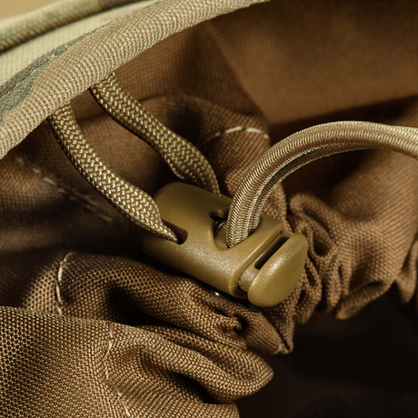 M‑Tac Magasinsæk Dump Pouch Lite Elite med quick-pull-lukking for sikker oppbevaring. Robust Cordura 500D-materiale, egnet for MOLLE-montasje.