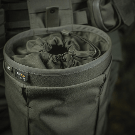 M‑Tac Magasinsæk Dump Pouch Lite Elite i holdbart Cordura 500D med quick-pull-lukking og MOLLE-kompatibilitet. Praktisk og robust design.