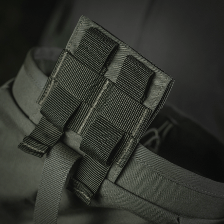 M‑Tac Magasinsæk Dump Pouch Lite Elite med MOLLE-monteringssystem i Cordura 500D-materiale for robust og sikker oppbevaring.