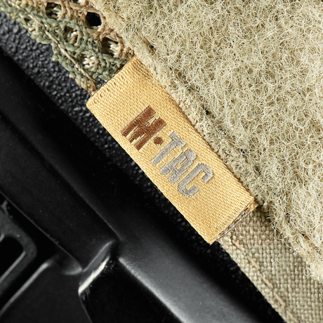M-Tac Hjelmcover Shroud Elite i Cordura 500D med MULTICAM-design og Velcro-paneler for TOR-D-hjelmer. Beskytter mot slitasje og skade.