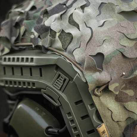 M‑Tac Vilha Hjelmcover FAST i Multicam-mønster med Cordura 500D for beskyttelse og kamuflasje på FAST-hjelmer.
