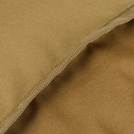 Detalj av materiale på M-Tac Pouch Sukharka Gen.3 XL i Cordura 500D, robust materiale i brun nyanse.