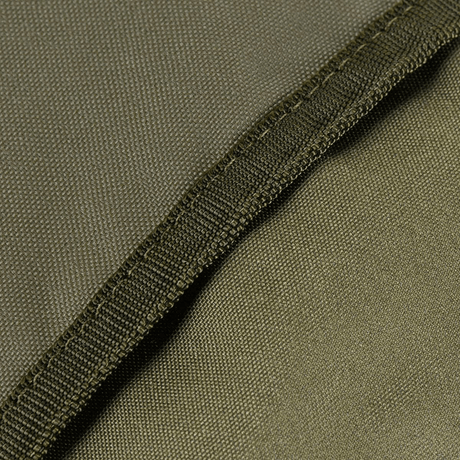 Nærbilde av M-Tac Pouch Sukharka Gen.3 XLs slitesterke Cordura 500D-materiale i olivengrønn fargetone.