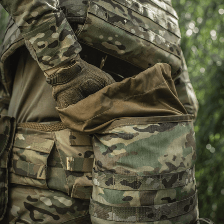 M-Tac Sukharka Gen.3 Pouch i kamuflasjemønster montert på militært utstyr, viser oppbevaringskapasitet og robust Cordura 500D.