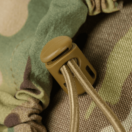 Detalj av M-Tac STURM Elite ryggsekk med Cordura og snorstrammer.