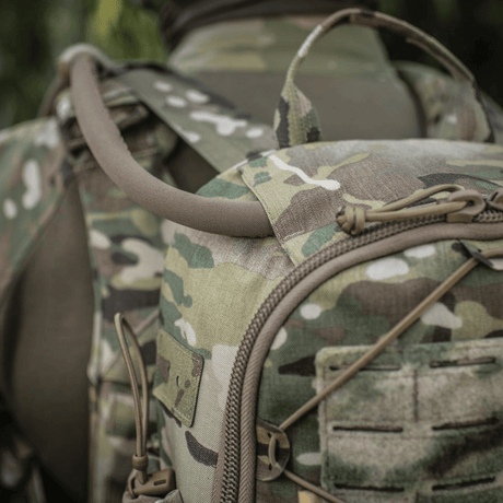 M-Tac STURM Elite ryggsekk i kamuflasjedesign med MOLLE Laser Cut panel og holdbare materialer, egnet for taktiske feltsituasjoner.