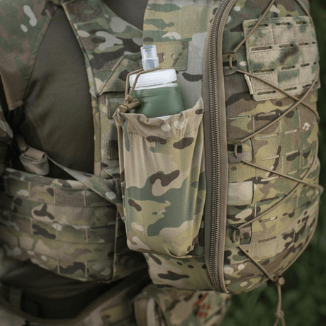 M-Tac STURM Elite ryggsekk med elastisk sidelomme og camo-design, for kortvarige oppdrag. Taktisk ryggsekk for nødvendig utstyr.