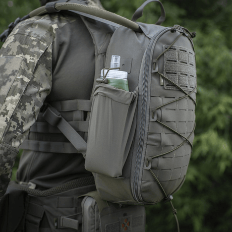 M-Tac STURM Elite ryggsekk - taktisk 15L ryggsekk med sidelomme og MOLLE Laser Cut-panel, produsert i Cordura 500D, ideell for utendørsbruk.