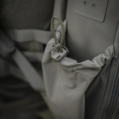 M-Tac STURM Elite ryggsekk med elastisk sidelomme og holdbar Cordura-konstruksjon, ideell for taktisk bruk og feltutstyr.