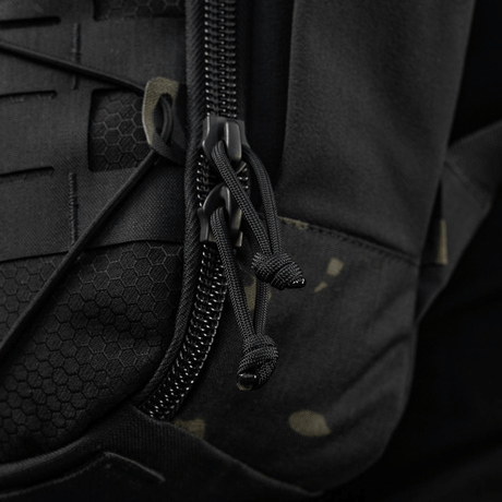 M-Tac STURM Elite ryggsekk i taktisk svart design med kraftig glidelås og Cordura-materiale, egnet for utstyrs‑transport i feltet.
