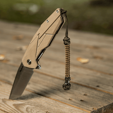 M-Tac Knife Lanyard Ninja i paracord med cupronickel-perle, praktisk tilbehør til lommekniv, viser stil og funksjonalitet
