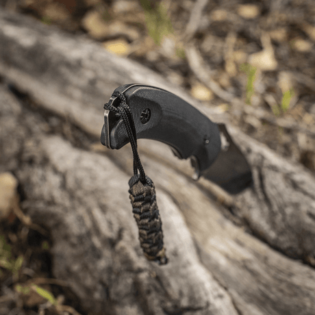 M-Tac Knife Lanyard Helix Skull - stilfull flettet paracord-lanyard til lommekniv, tilfører karakter og funksjonalitet.