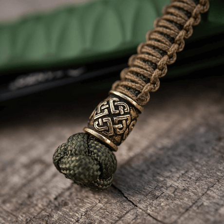 M-Tac Knife Lanyard Celtic i flettet paracord med keltisk mønster, stilfullt og praktisk tilbehør til kniver, utstyr og lykter.