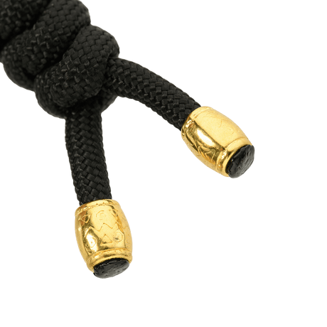 M-Tac Zeus Lanyard i flettet paracord, svart med gylne ender, stilfullt og praktisk knivtilbehør.