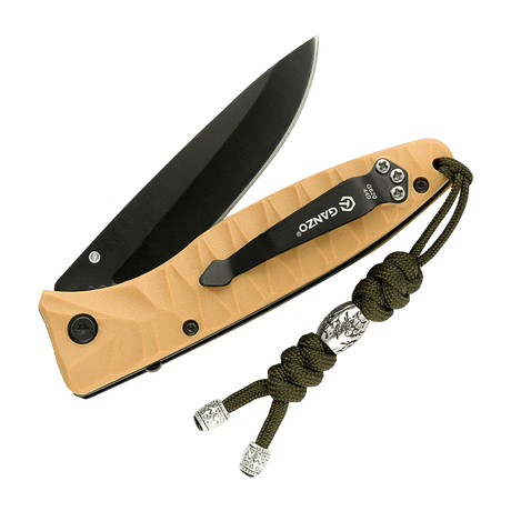 M-Tac Zeus Stainless Steel Lanyard festet til en kniv med flettet paracord og dekorativ perle for rask tilgang og funksjonalitet.