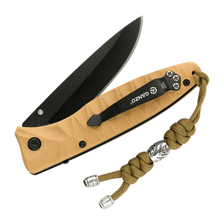 M-Tac Zeus Stainless Steel Lanyard på en kniv, flettet paracord med dekorativ ståelperle, praktisk for rask tilgang til utstyr.