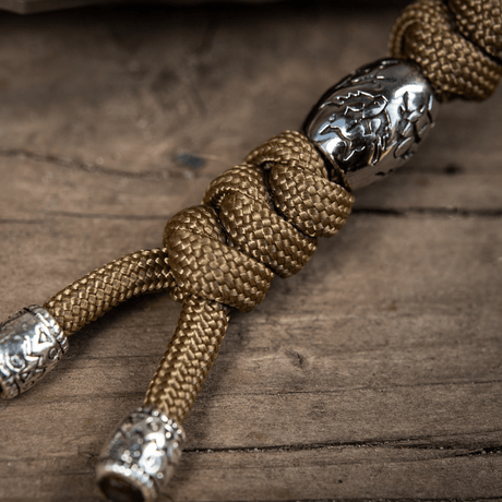 M-Tac Zeus Stainless Steel Lanyard med flettet paracord og dekorative perler, perfekt for kniv eller utstyr.