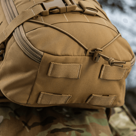 M-Tac ryggsekk Sturm Elite Gen.II i slitesterkt Cordura-materiale, med MOLLE-system og elastisk snøring for ekstra utstyr.