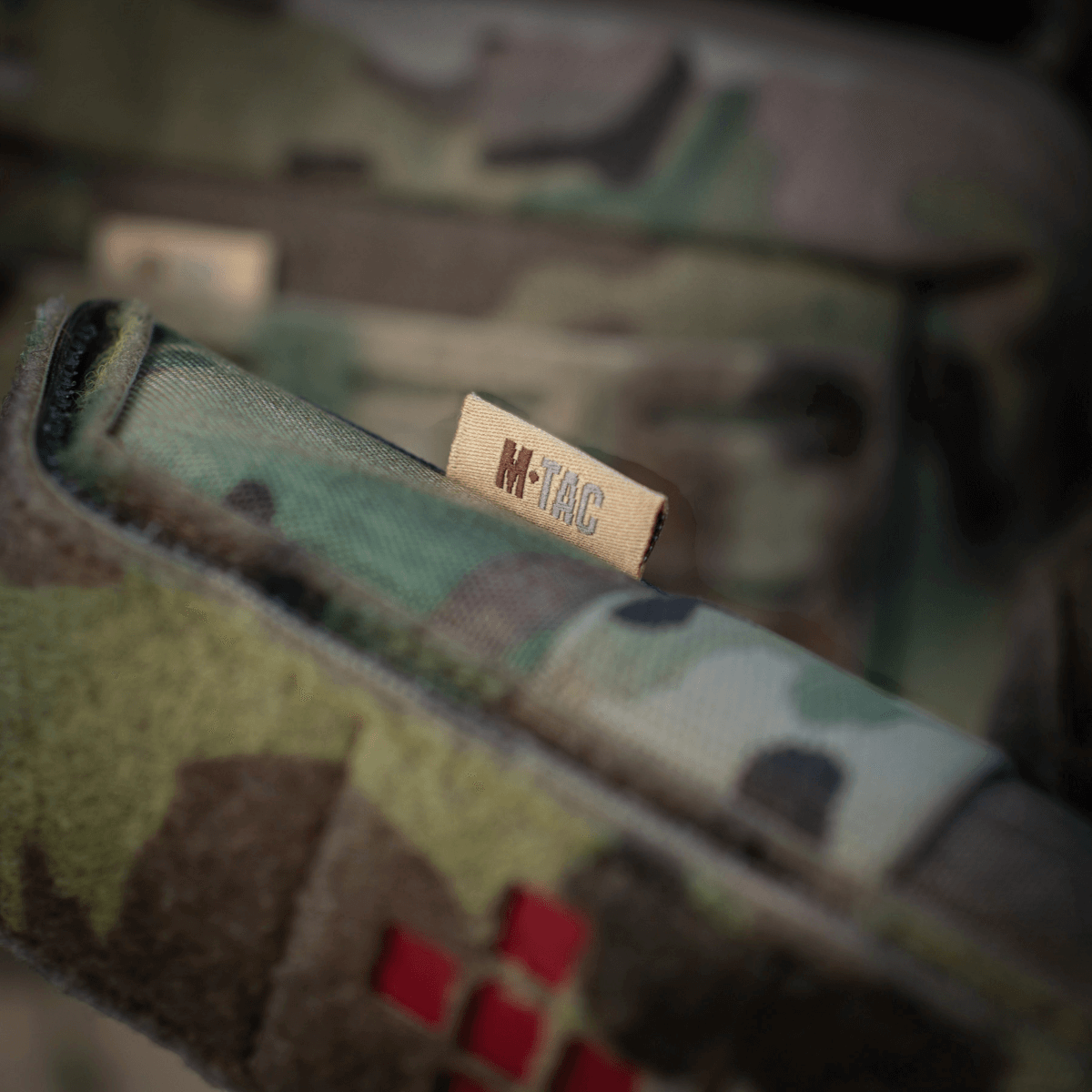 M-Tac Lomme til Tourniquet Closed i camouflage med lukket design til pålidelig beskyttelse ved førstehjælp og nødssituationer.